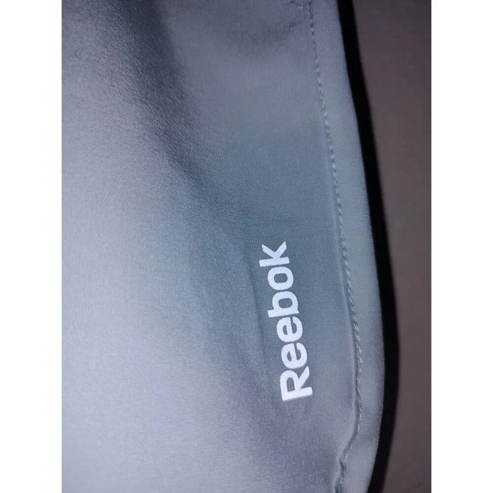 New with tags Women's Reebok Gym Workout Athletic Light Blue Shorts Size L / G